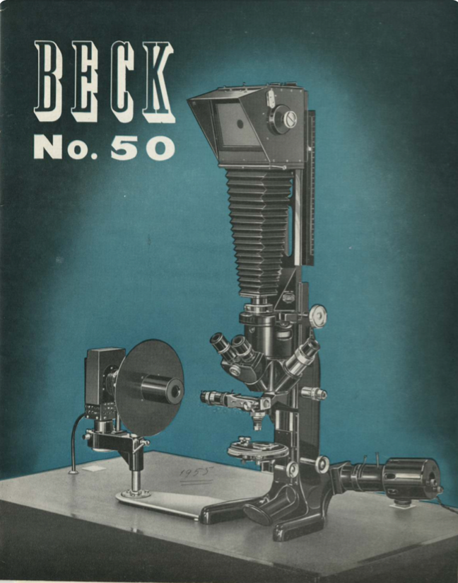 A black and white photo camera
Description automatically generated
