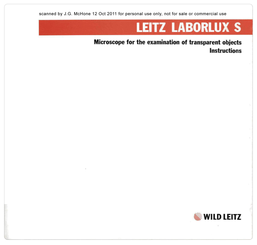 A white rectangular object with red and black text
Description automatically generated