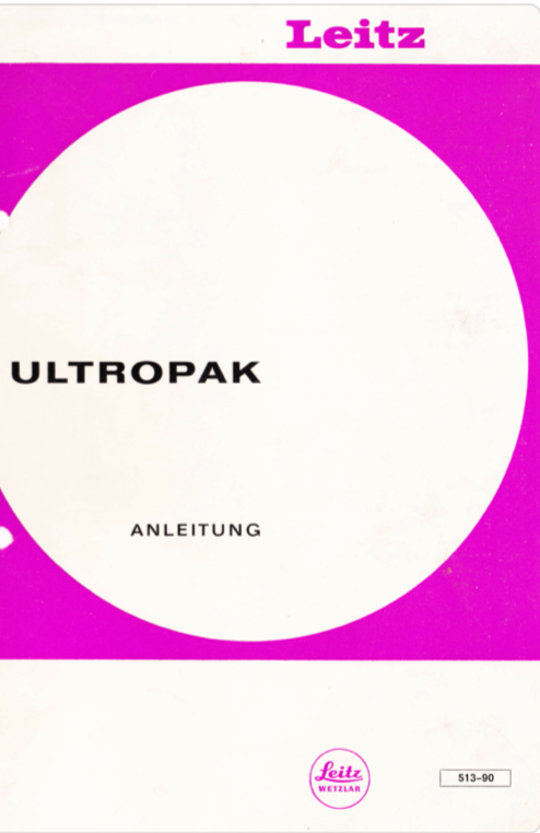 A purple and white cover with a white circle
Description automatically generated