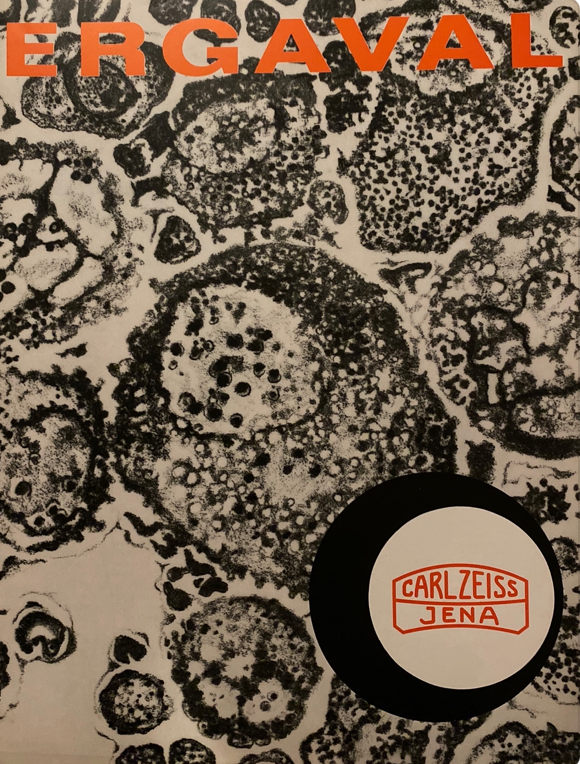 A black and white cover with a circle with a red text
Description automatically generated