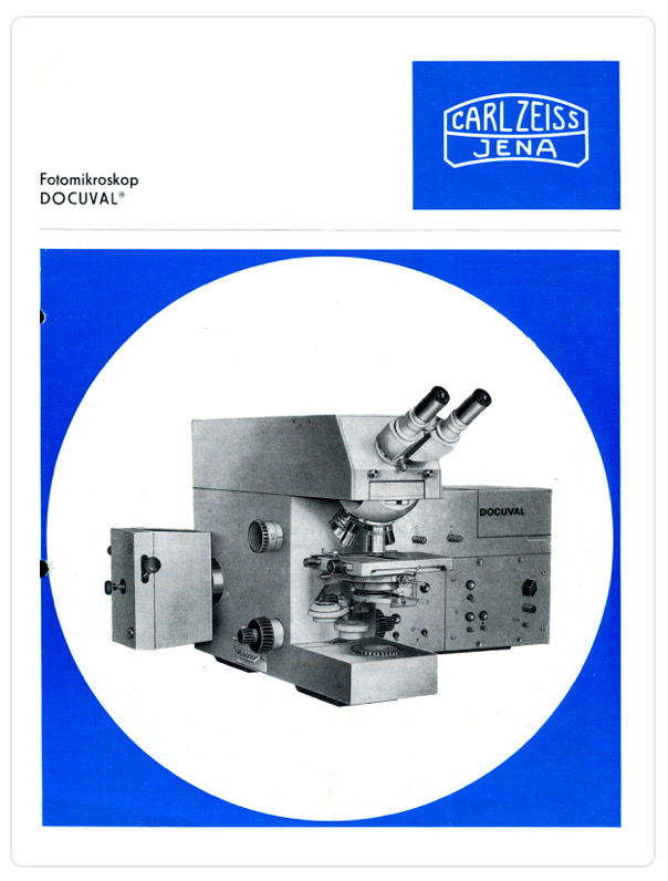 A white and blue cover with a microscope
Description automatically generated