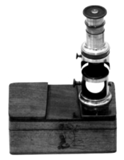 A close-up of a microscope
Description automatically generated with medium confidence