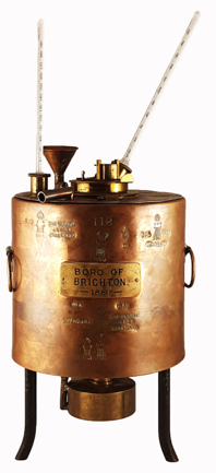 A copper cylinder with a funnel and a funnel
Description automatically generated with medium confidence